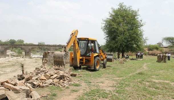UIT Destroys Illegal Boundary Wall near Ayad River