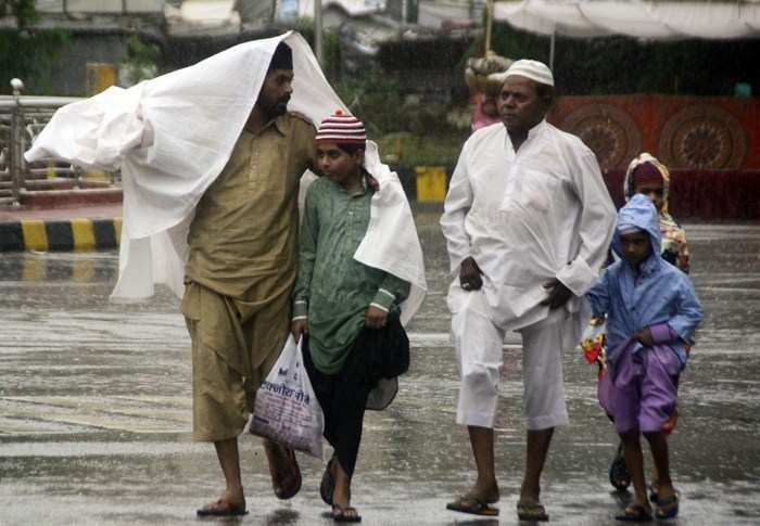 [Photos] Udaipur celebrates Eid amid heavy rain