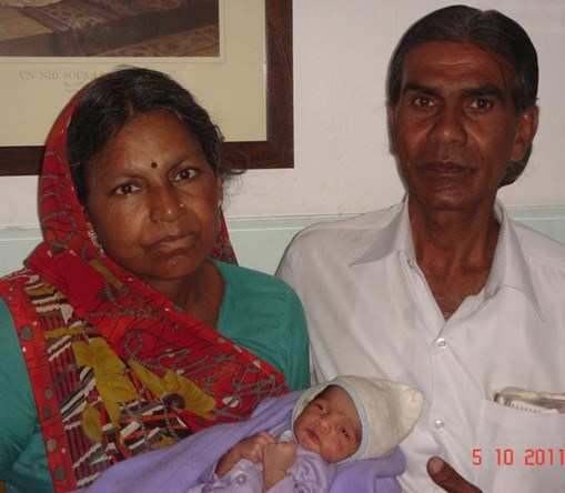 IVF Blessed Elderly Couple by a Baby Boy