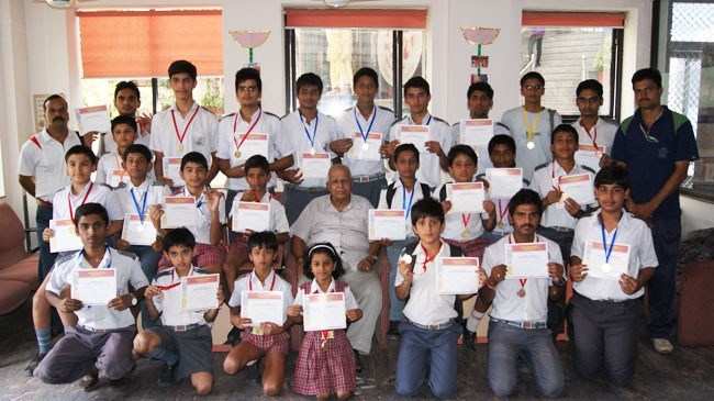Alok conducts Inter-School Swimming Competition