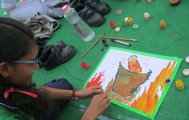 600 Children paint "Khushi: Our Girls Our Pride" on Canvas