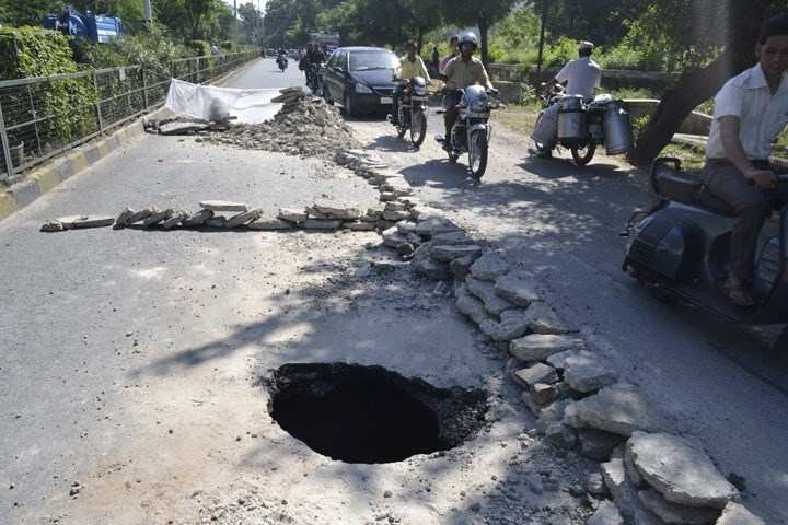Hole in the Road, Slows Down Traffic
