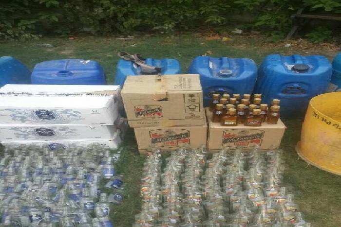 Rented house used to make fake liquor – 2 arrested