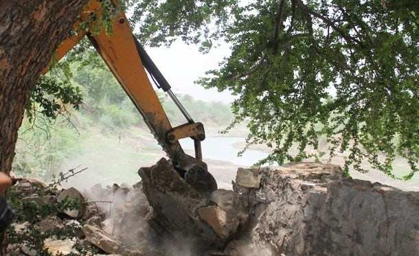 UIT Destroys Illegal Boundary Wall near Ayad River