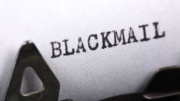 Woman arrested for blackmailing a retired policeman