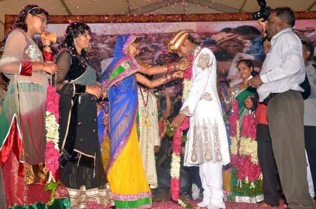 92 Poor and disabled couples tied the knot