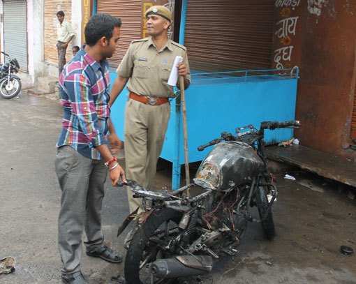 Motorcycle set on fire over dispute at Neemach Kheda