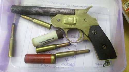 Youth arrested with country pistol and cartridges