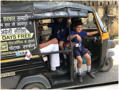 Hanging Schools Bags and School Children in Auto-Rickshaws