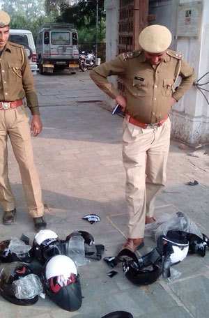 Traffic police inspects helmets, destroys 500 sub-standard ones