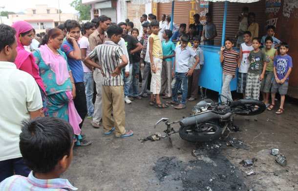 Motorcycle set on fire over dispute at Neemach Kheda