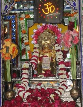 Shani Dev Decorated With Gold worth Rs.8000