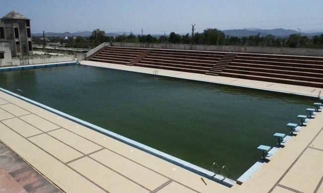 Maharana Pratap Khel Gaon – No shade or shelter provided at the swimming pool