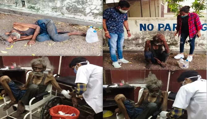 old man helped by youths