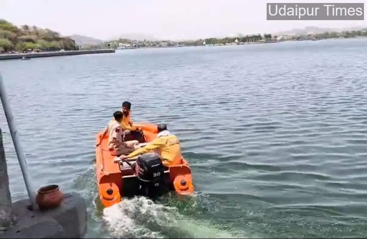 Civil Defence divers conduct search operation at Fateh Sagar Lake in Udaipur after businessman Lalit Mehta feared drowned.