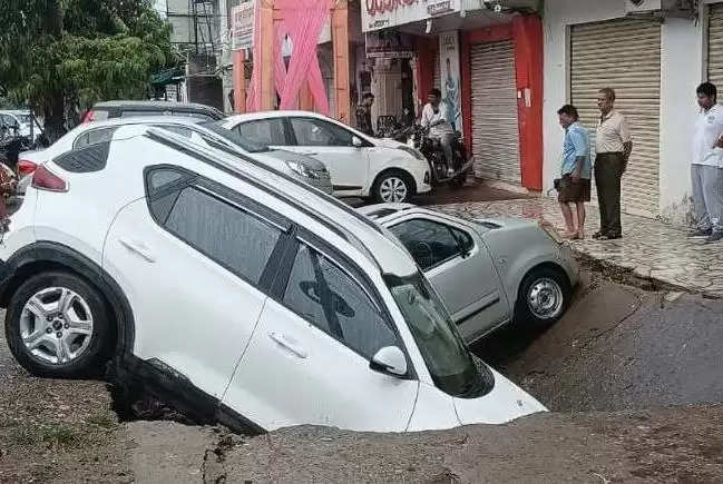 car fell into drain