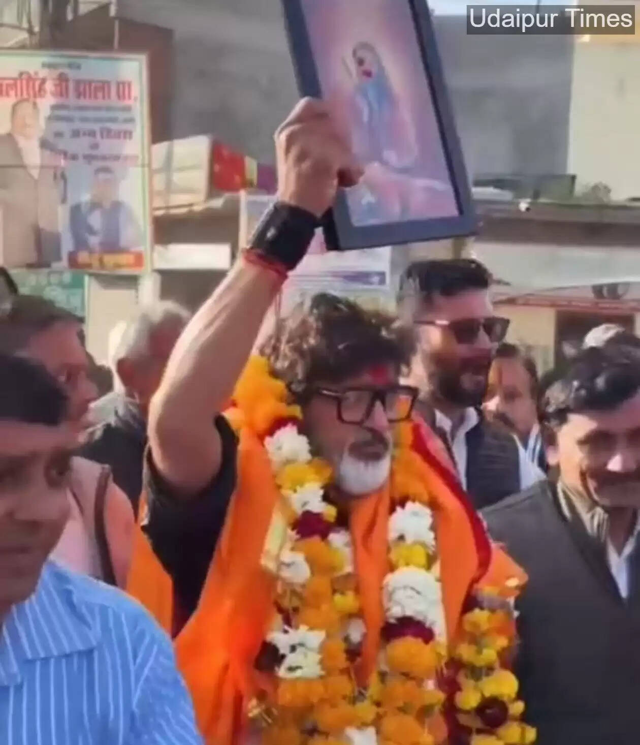 Dr. Ashok Sharma being welcomed by villagers with garlands and flowers at Badgaon Satellite Hospital, Udaipur