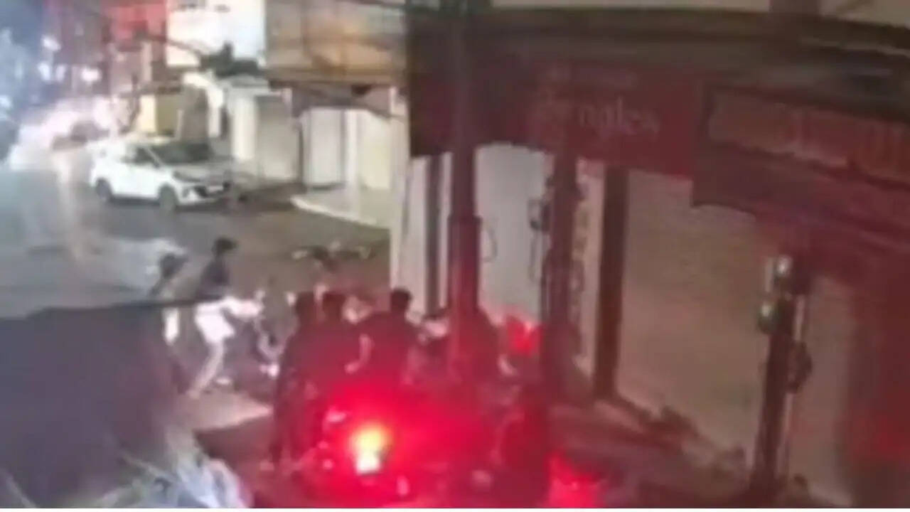 Police investigation underway after firing and stabbing incident in Pipli Chowk, Udaipur, leaving three injured.
