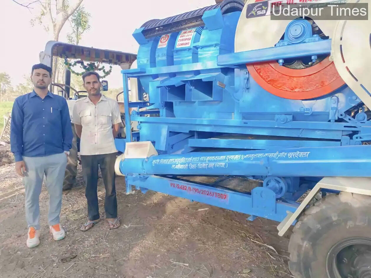 Farmer using multi crop thresher machine in Chittorgarh Rajasthan under government subsidy scheme