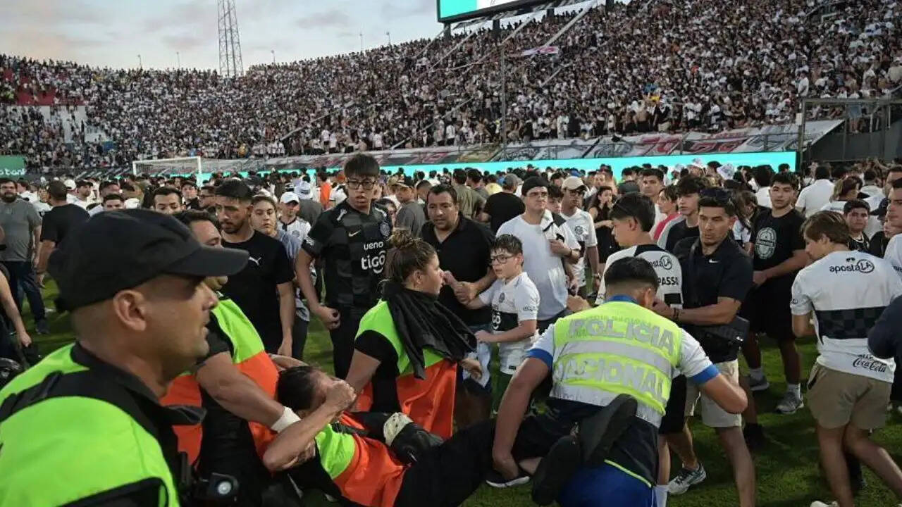 Stadium turns battleground during derby as urine-filled bottles thrown