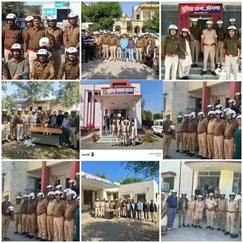 Police officers and citizens receiving helmets during Udaipur road safety campaign