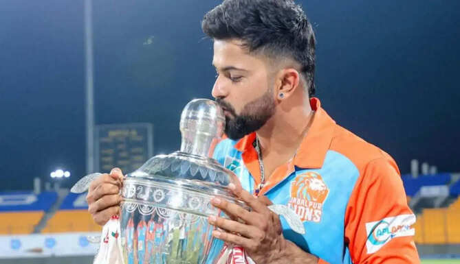 Saransh Jain celebrates after being named in India's Test squad for the two-match series against Sri Lanka.