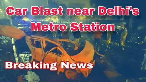 Firefighters and police at the site of the Red Fort Metro car blast in Delhi