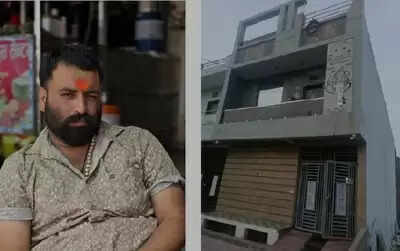 Udaipur police officers outside the house seized in a ₹60 lakh gold fraud case.