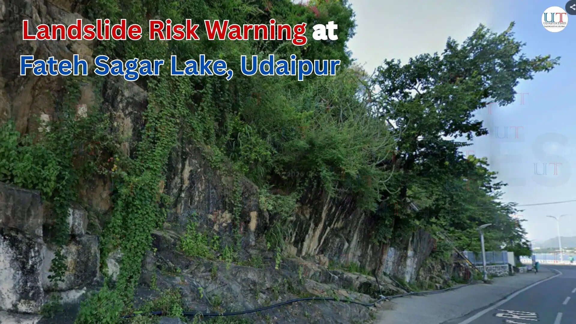 Rocky hills near Fateh Sagar Lake in Udaipur showing visible cracks and potential landslide risk along the roadside.