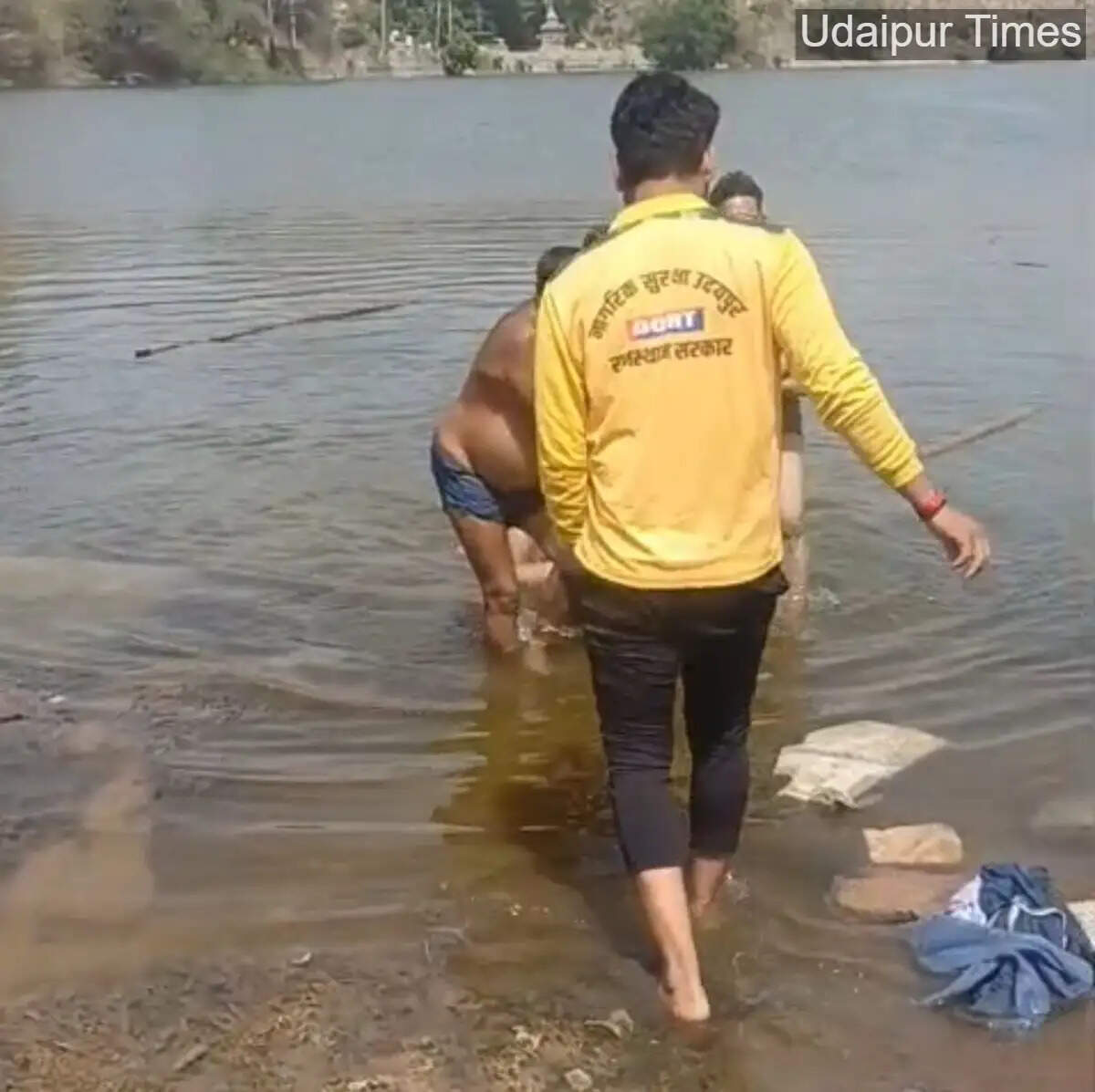 Civil Defence and police officials at Eklingji Pond in Udaipur after a drowning incident involving a 40-year-old man.