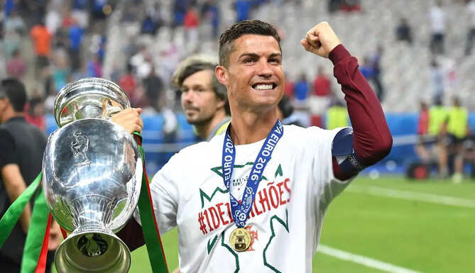 Cristiano Ronaldo celebrating Portugal's UEFA Euro 2016 triumph after sharing an emotional anniversary tribute on social media.