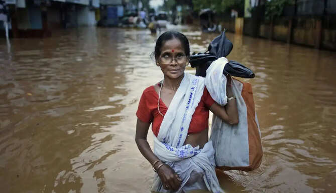 Flood-affected areas in Assam as the IMD issues a heavy rainfall warning after the state's flood death toll rises to 78.