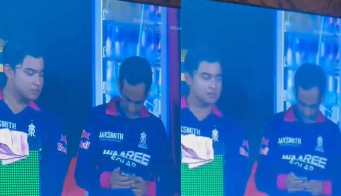 A viral clip from IPL 2026 shows a Rajasthan Royals staff member allegedly using a mobile phone during RR vs RCB match, sparking match-fixing rumours and fan debate online.