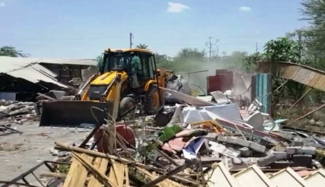 bulldozer on historysheeter property