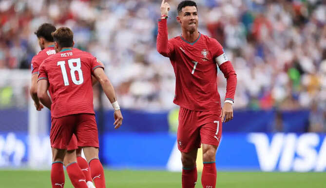 Cristiano Ronaldo celebrates after scoring twice as Portugal beat Uzbekistan 5-0 to go top of Group K at FIFA World Cup 2026