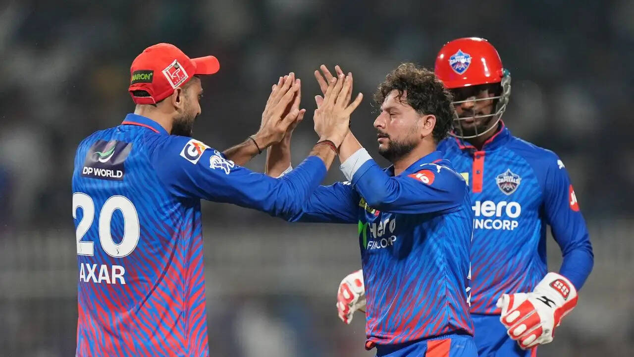 KL Rahul celebrates his half-century while Kuldeep Yadav reacts after taking wickets during DC vs KKR IPL 2026 clash at Eden Gardens