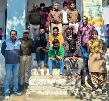 Alt Text: Police bust cyber fraud and online gaming scam gang in Udaipur; seven accused arrested in a villa raid.