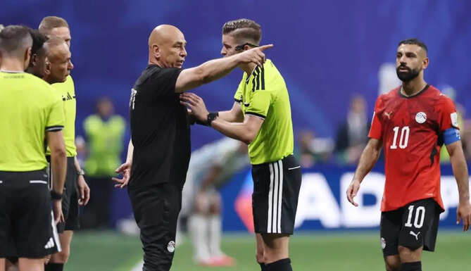Egypt players protest during the World Cup match against Argentina before filing an official complaint with FIFA over refereeing decisions.