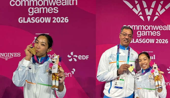 Mirabai Chanu celebrates after winning the women's 48kg gold medal at the Commonwealth Games with a record-breaking performance.
