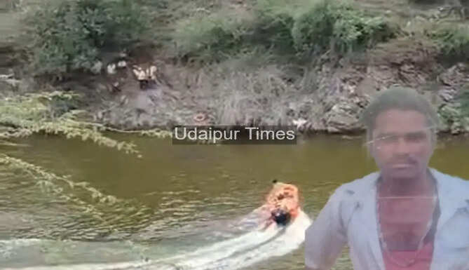 Civil Defense personnel conducting a rescue operation at Amar Chandiya Pond in Gogunda, Udaipur, after a youth reportedly drowned while grazing goats.