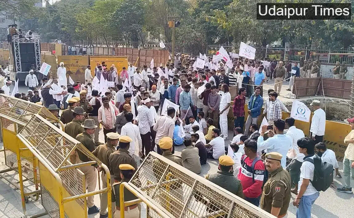Tribal community members protesting outside Udaipur Collectorate against UDA actions