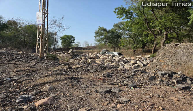 Officials of the Udaipur Development Authority carrying out anti-encroachment action and reclaiming 75,000 square feet of government land worth ₹35 crore in Chikalwas village, Udaipur.