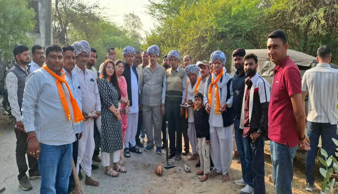 Mavli MLA Pushkar Lal Dangi performing foundation ceremony for CC road construction by Hindustan Zinc Debari Smelter in Govla Putiya village