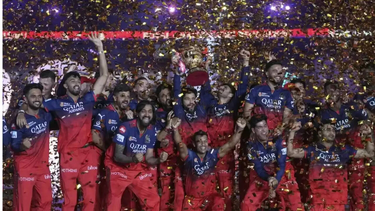 Royal Challengers Bangalore team with Virat Kohli celebrating IPL title amid reports of franchise sale by Diageo RCB for Sale | Diageo to Sell Royal Challengers Bangalore Before March 2026