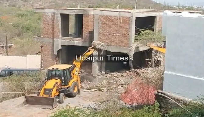 UDA officials removing illegal constructions during an anti-encroachment drive in Hawala village near Udaipur, Rajasthan.