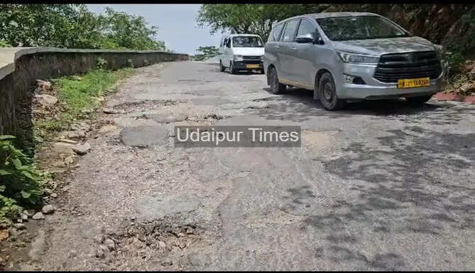 Broken safety wall on Sajjangarh Monsoon Palace road in Udaipur during monsoon season