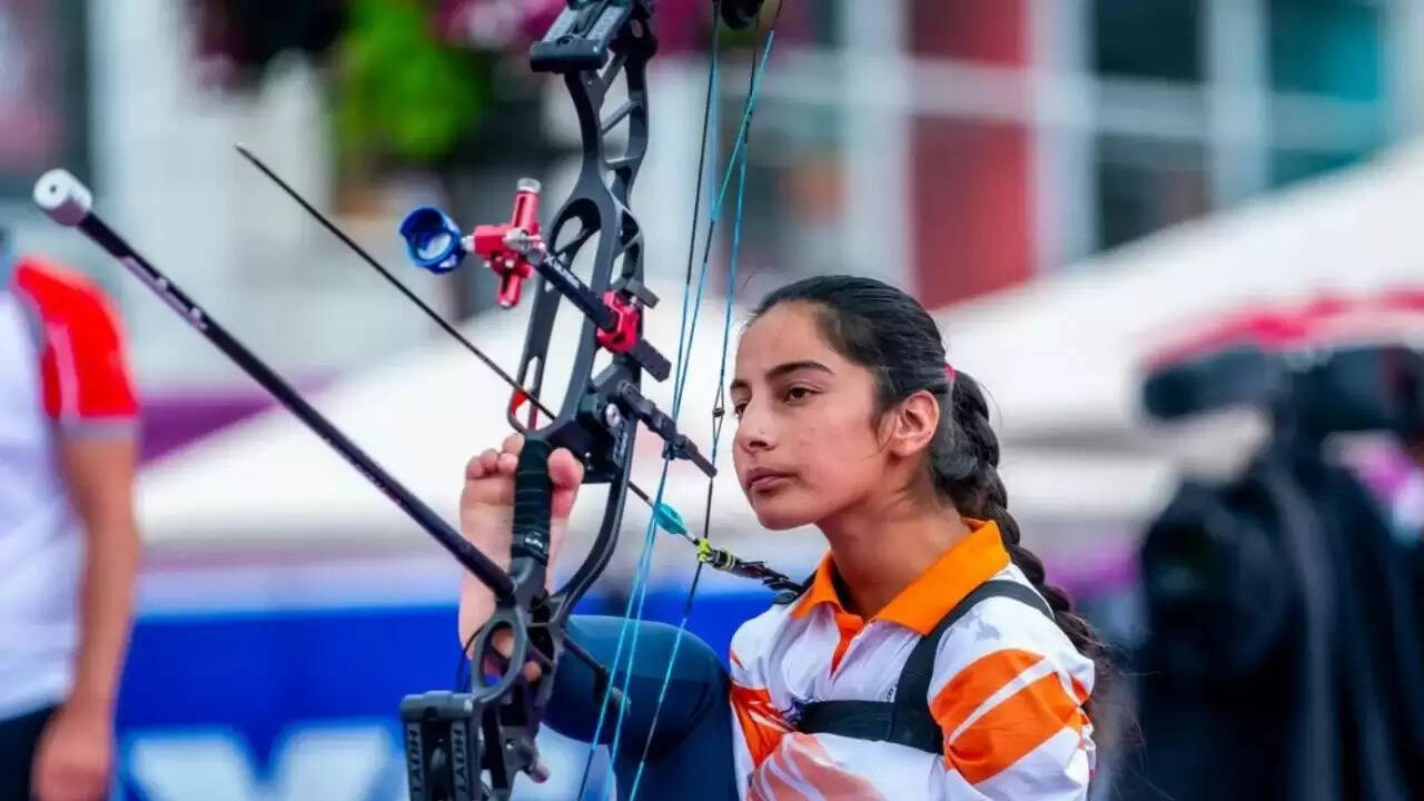 Sheetal Devi celebrating her selection to India&rsquo;s Able-Body Junior Archery Team, holding a bow with confidence.