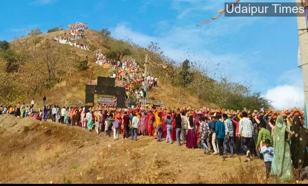Devotees carrying Ganga Jal Kalash during historic religious event at Nandani Mata Dham in Wagadh, Rajasthan