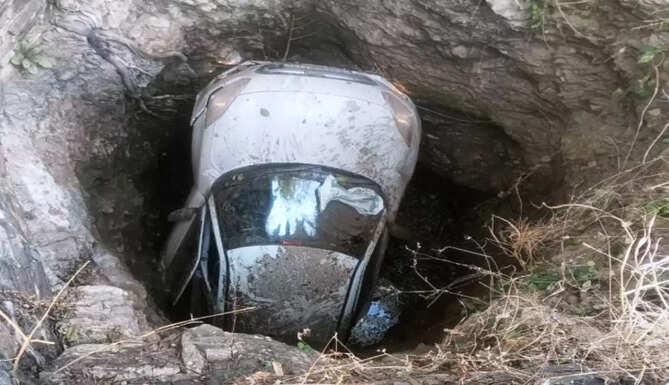 car fell into well