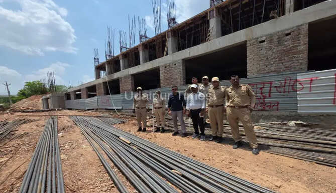 UDA officials sealing an unauthorized commercial construction on hill land near Kailashpuri Lake in Udaipur.